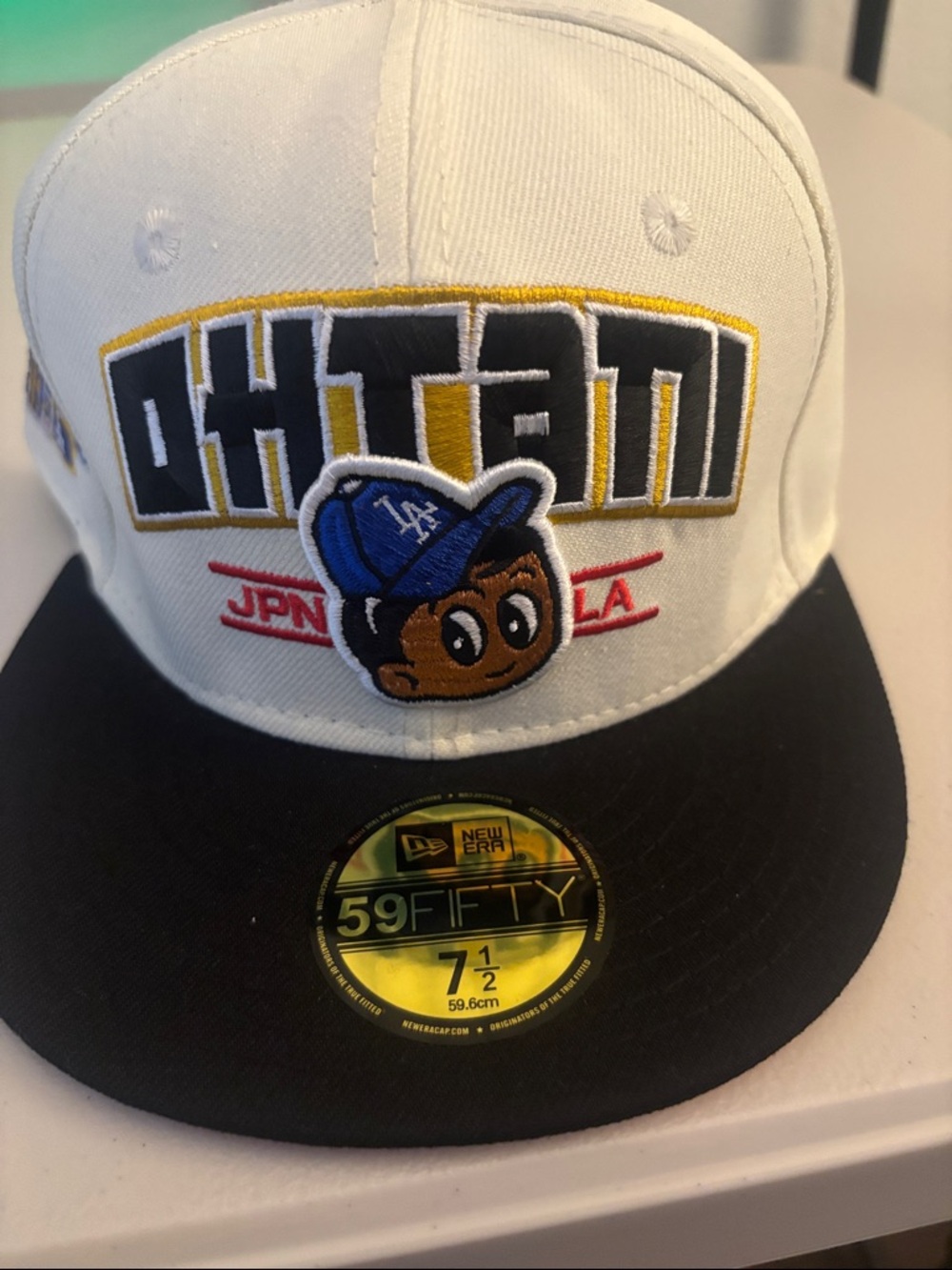New Era White & Black Baseball Cap with Colorful Embroidered Front 7 1/2